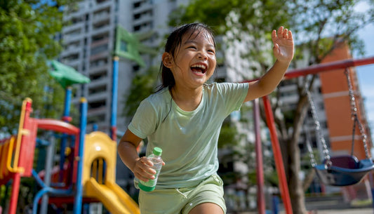 Sweaty child running outdoors attracting mosquitoes