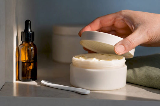 Anonymous body butter jar on storage shelf