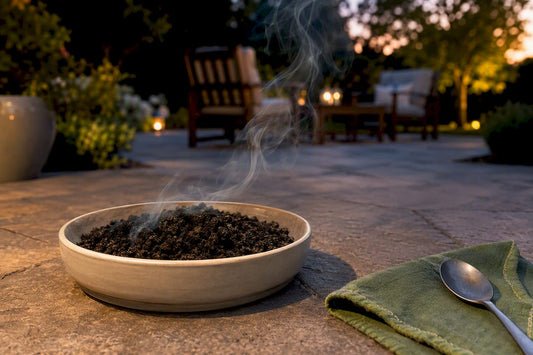 Smoldering coffee grounds on a patio